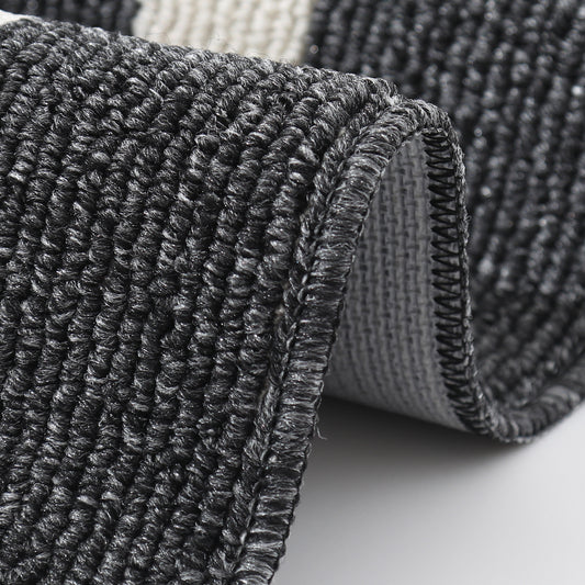 Modern WinniHouse rug with geometric border, featuring a non-slip backing and stylish design for contemporary home decor.