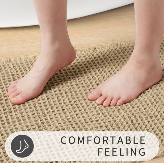 Absorbent waffle texture bathroom rug by WinniHouse with anti-slip backing, ideal for dry and cozy bathroom floors.