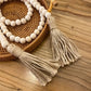 Wooden beads garland with tassels, 32 inches, farmhouse boho decor, rustic country style for home, living room, or bedroom.