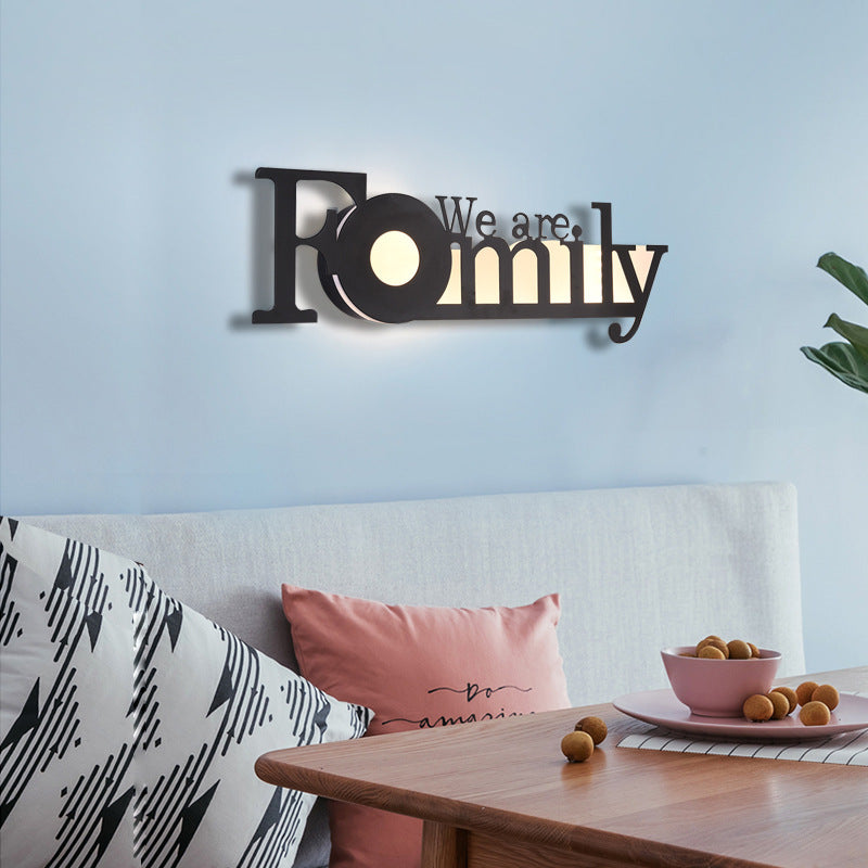 WinniHouse LED English letter wall lamp mounted on a background wall, creative illuminated home decor piece.