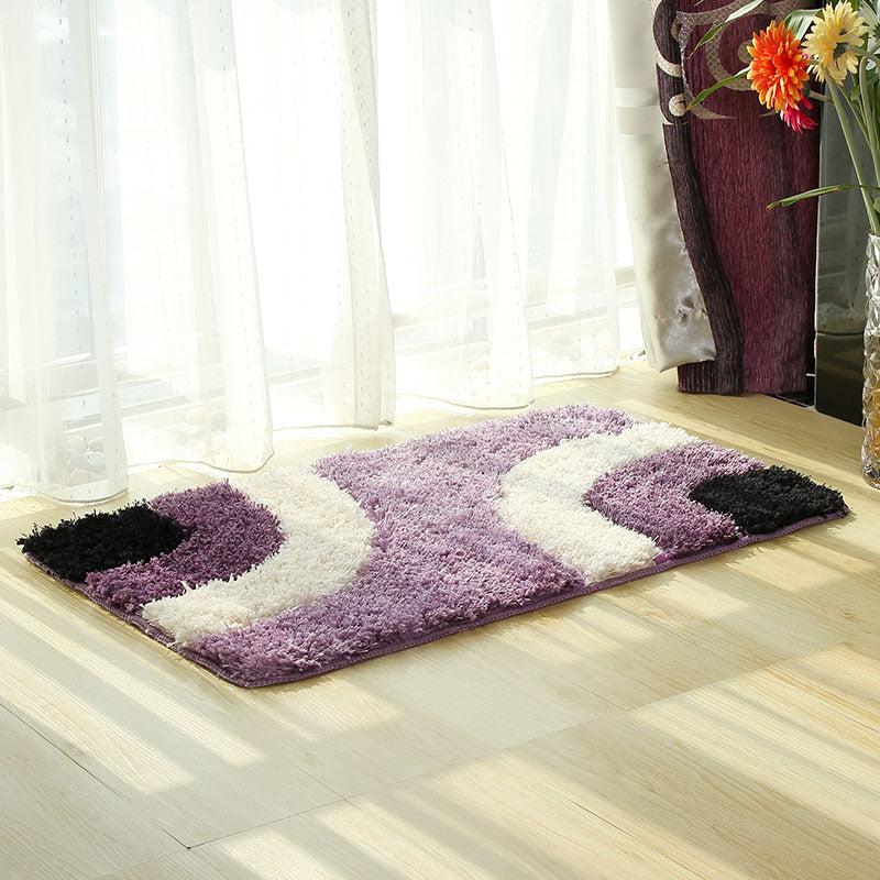 Soft microfiber bathroom rug with abstract wave design and non-slip backing by WinniHouse.