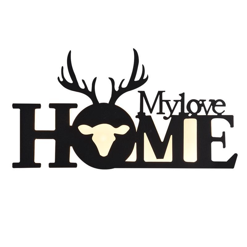 WinniHouse LED English letter wall lamp on a background wall, creative home decor lighting with illuminated letters.