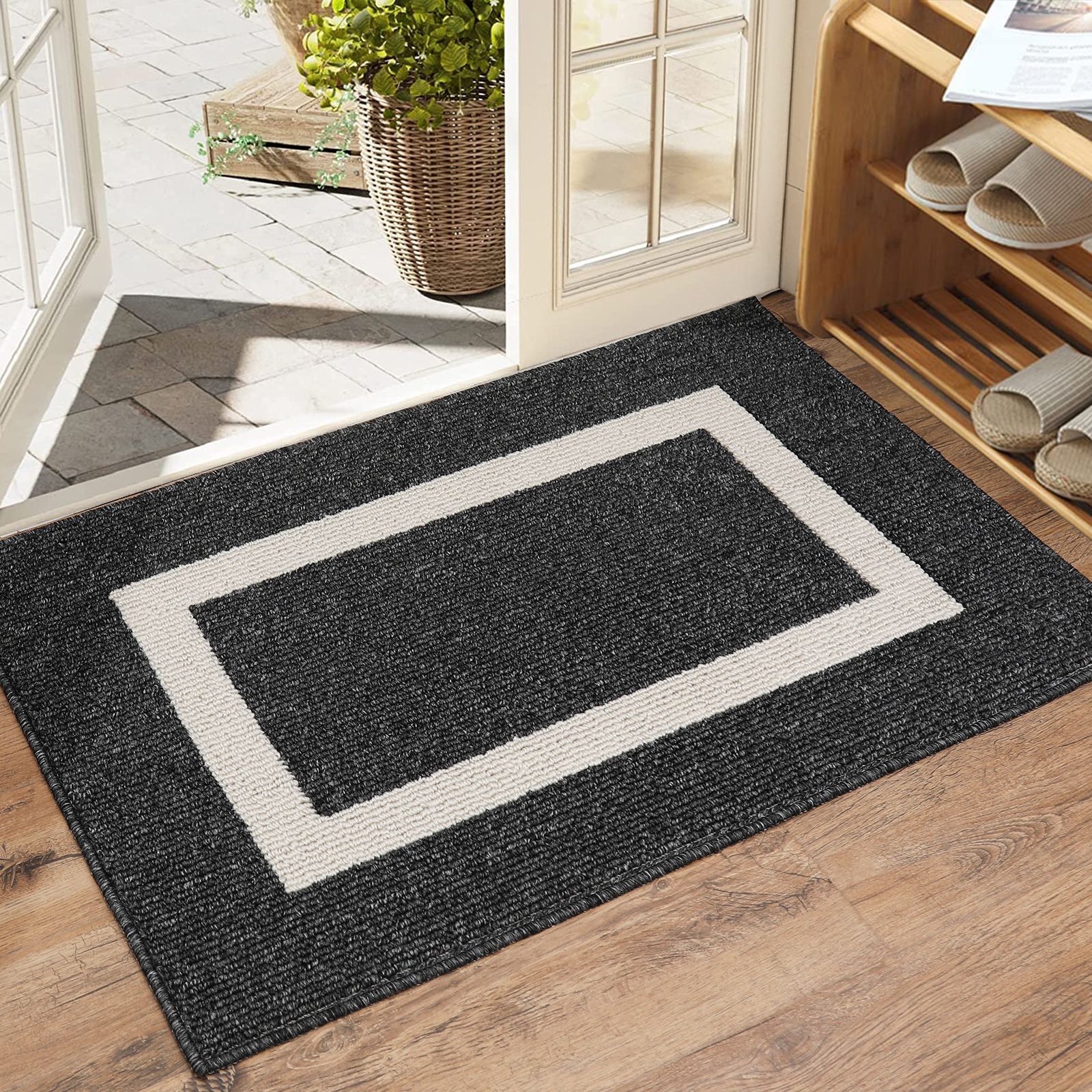 Modern WinniHouse rug with geometric border, featuring an anti-slip backing, ideal for stylish and safe home flooring.