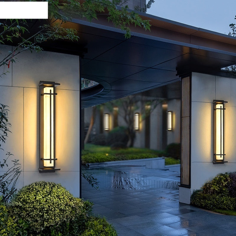 WinniHouse strip wall lamp with modern garden-style design, featuring a sleek, elongated light fixture mounted on a wall.