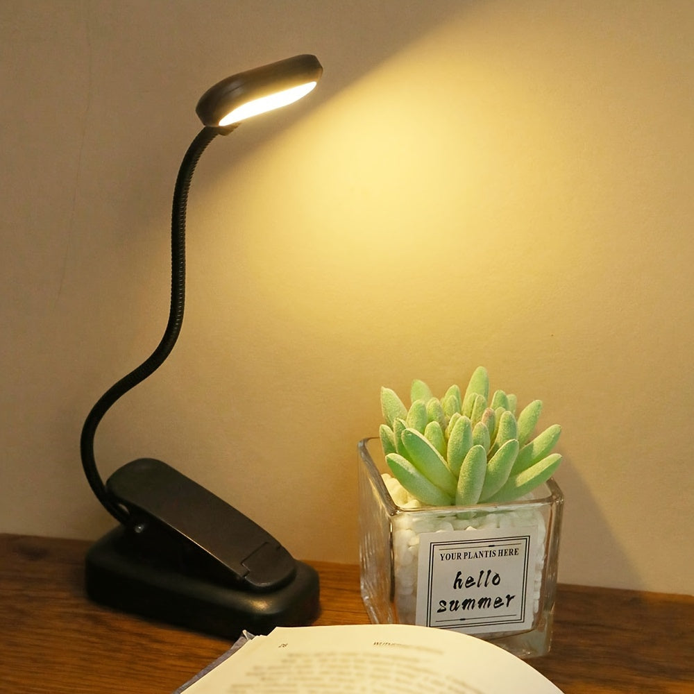 WinniHouse LED desk lamp with adjustable arm and clip, battery-powered, modern minimalist design for reading and workspace lighting.