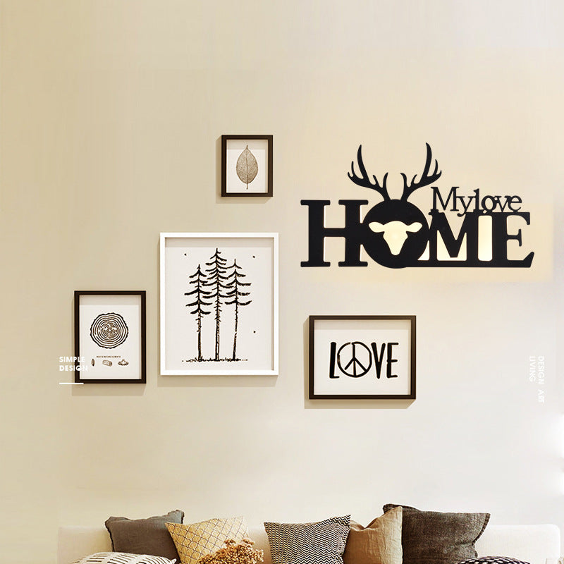 WinniHouse LED English letter wall lamp illuminating a creative background wall, perfect for modern home decor.