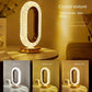 Luxurious oval glass table lamp by WinniHouse with USB charging, decorative night light for living room, bedroom, and festive decor.