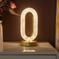 Luxury oval crystal table lamp with USB charging port, decorative night light for living room, bedroom, and festive decor.