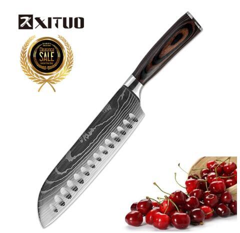 Set de cuchillos profesionales estilo Damasco con mangos de madera premium, ideal para cocina gourmet y preparación de alimentos.