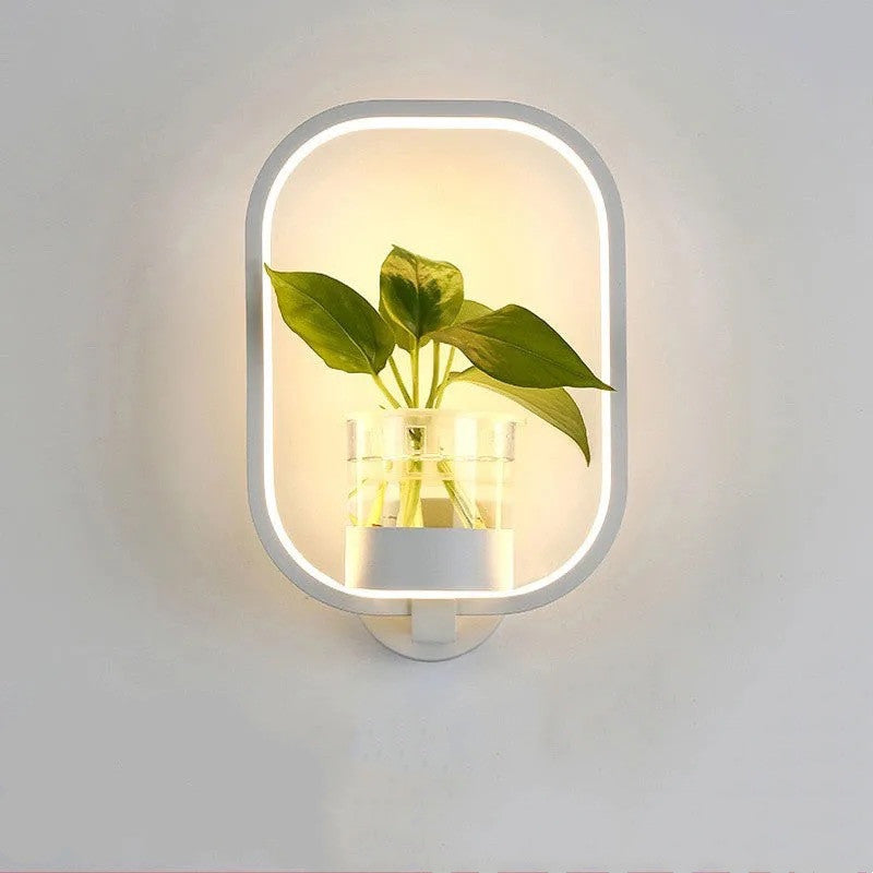 Decorative wall lamp by WinniHouse mounted on a background wall, showcasing stylish lighting design for interior decor.