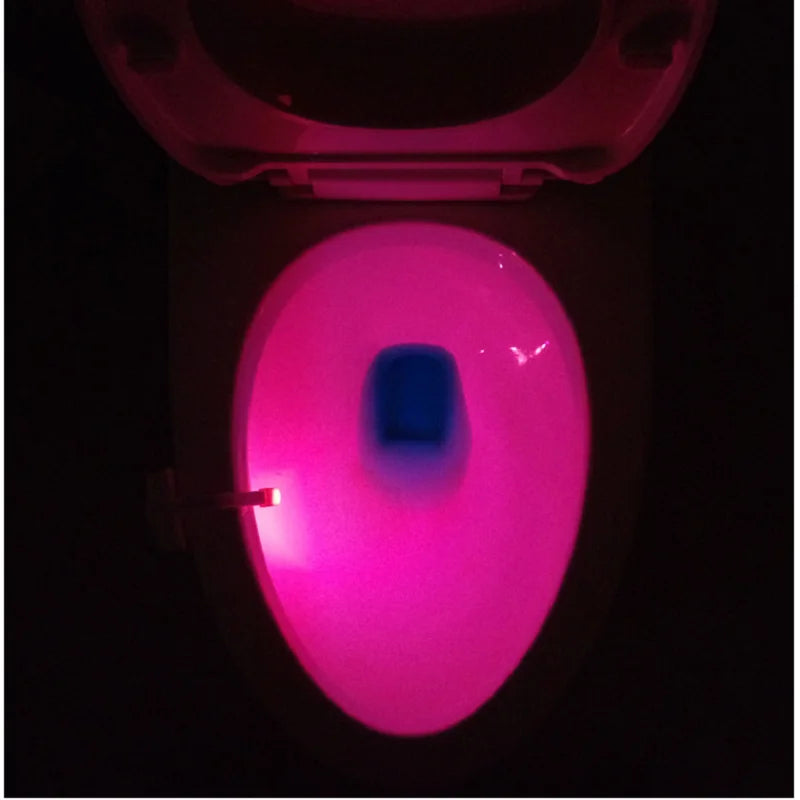 WinniHouse smart toilet with motion sensor for night use, featuring modern design and touchless flushing in a bathroom setting.