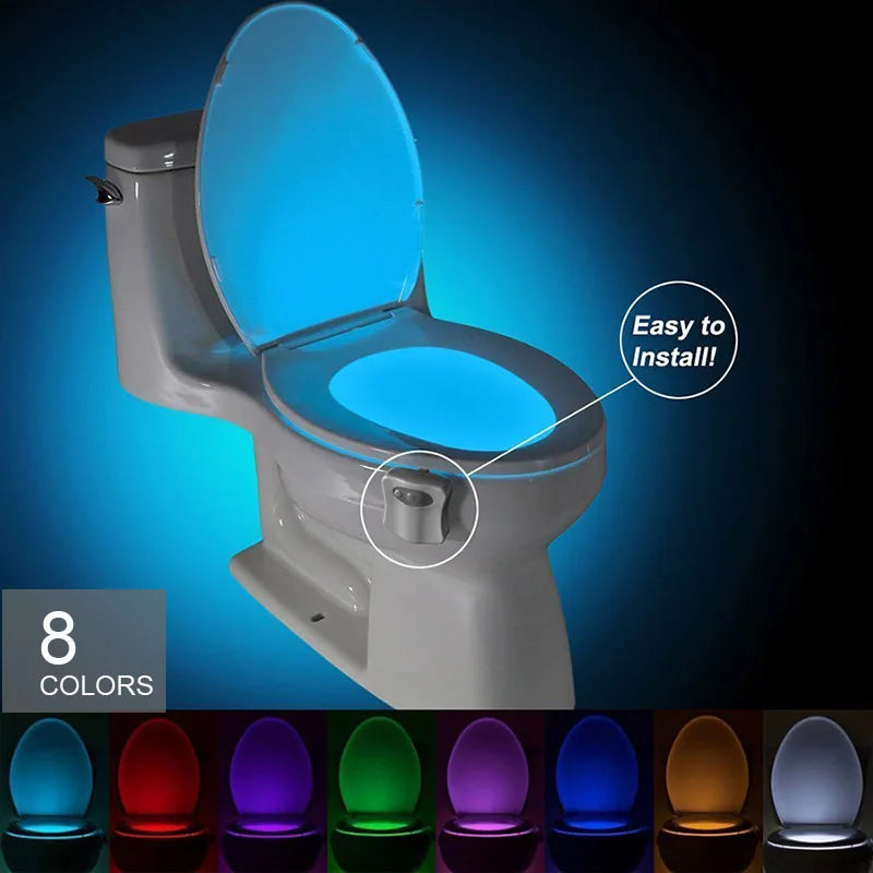 Smart toilet with motion sensor for nighttime use by WinniHouse, showing the sleek design and sensor technology in a bathroom setting.