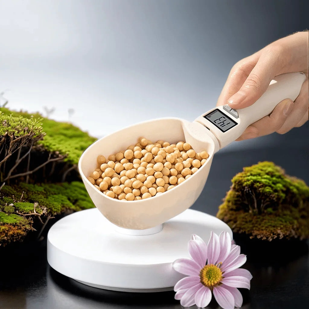 Digital food measuring spoon by WinniShop with a sleek design, suitable for measuring pet and baking ingredients.