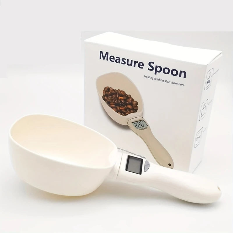 Digital food measuring spoon by WinniShop, used for accurate pet and food ingredient measurements in the kitchen.