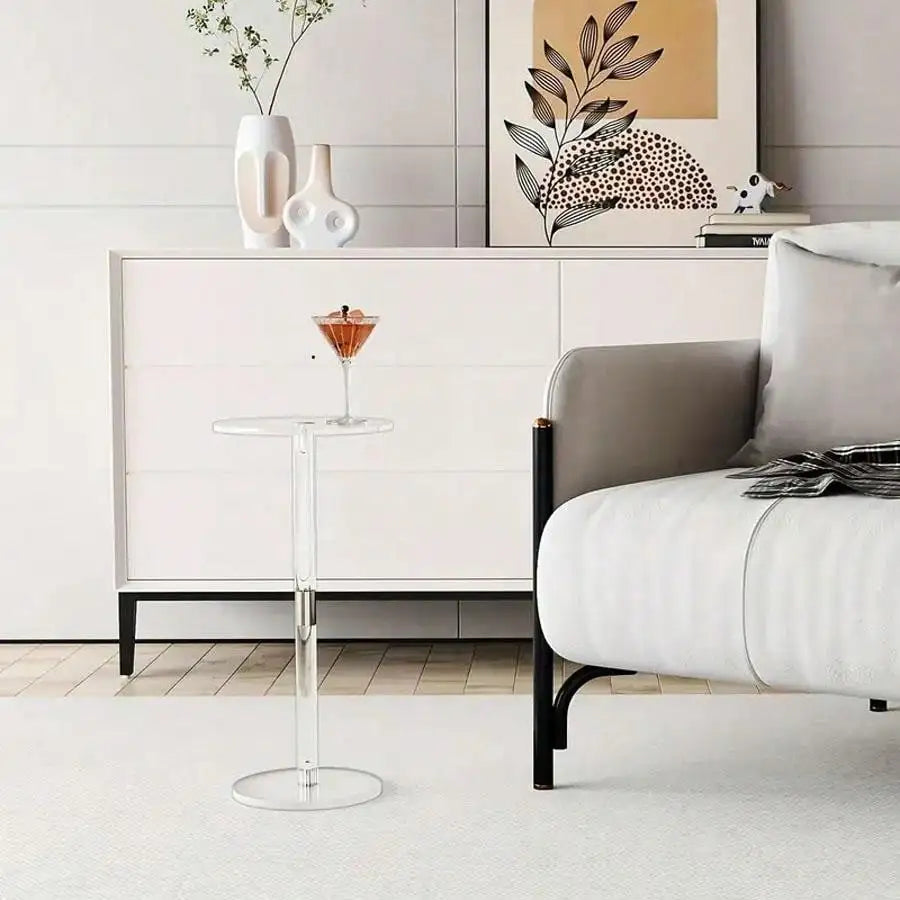 Small round transparent acrylic tea table by WinniShop, modern space-saving side table for living room with minimalist design.