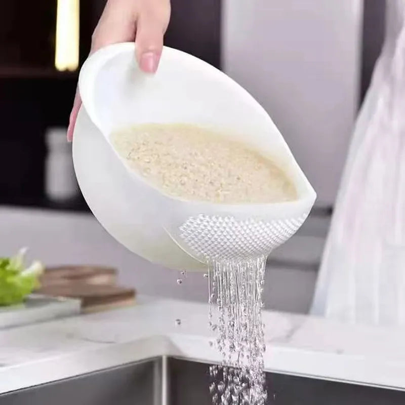 Plastic rice strainer from WinniHouse, versatile kitchen colander for washing rice, fruits, and vegetables in the sink.