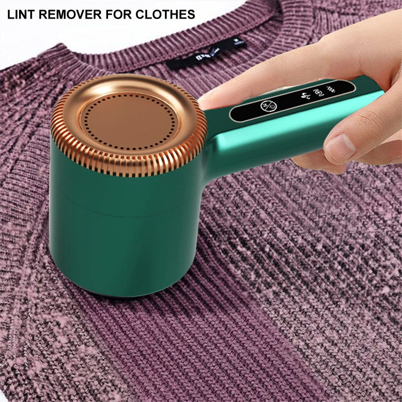 Portable electric lint remover for clothing by WinniShop, showing a handheld device with a shaving head on a cozy sweater.
