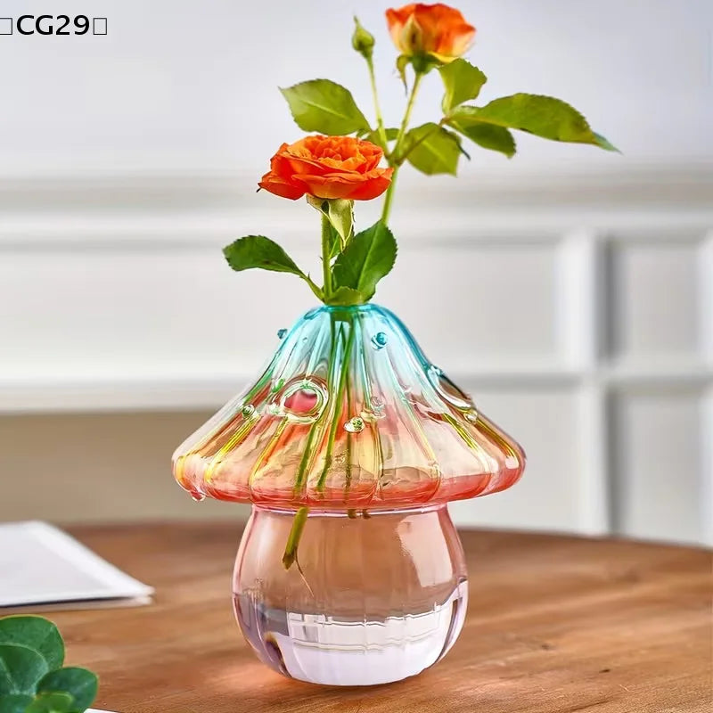 Colorful glass mushroom-shaped vase by WinniHouse, featuring vibrant hues and a unique, whimsical design.