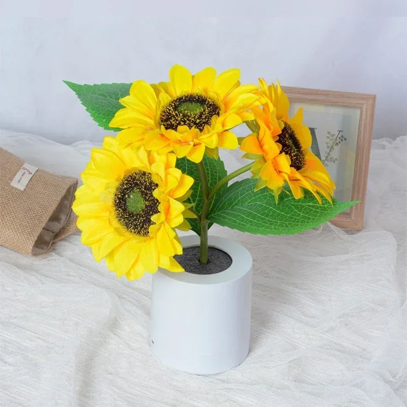 WinniHouse LED sunflower night light with rechargeable design, showing a bright, cheerful sunflower shape illuminating in a dim room.