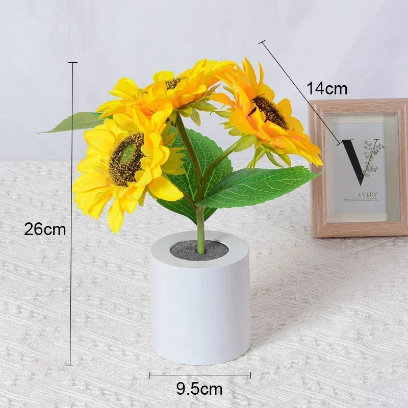 Rechargeable LED sunflower night light by WinniHouse, showing a bright yellow sunflower-shaped lamp with a warm glow.