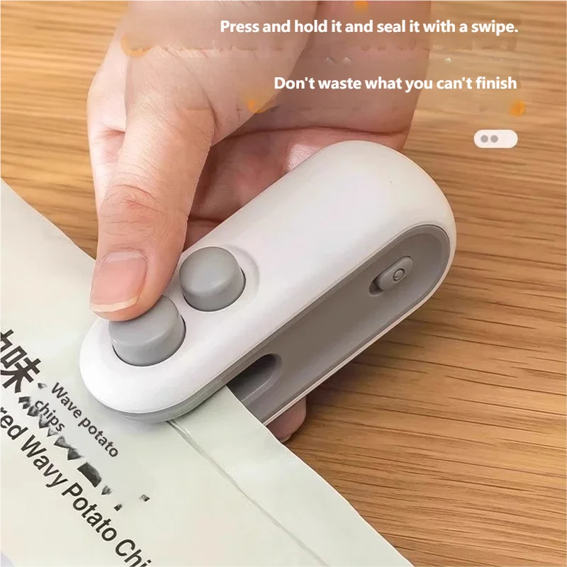 WinniShop portable USB rechargeable food sealer with clip and storage bag, compact heat sealer for plastic food bags.