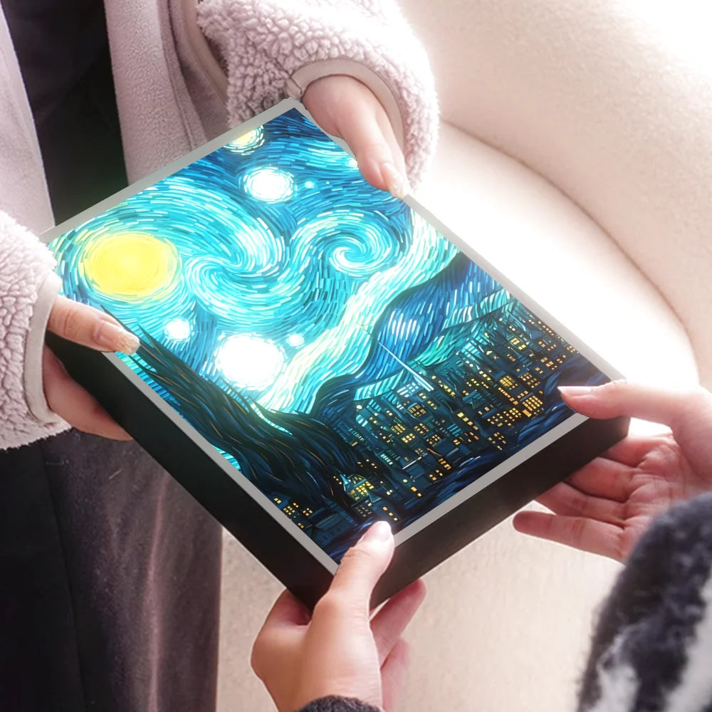 Starry Night LED artistic night light by WinniHouse inspired by Van Gogh, showcasing a vibrant starry sky scene with warm illumination.