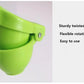 Portable WinniHouse manual lemon and orange juicer, compact kitchen tool for extracting fresh citrus juice easily.