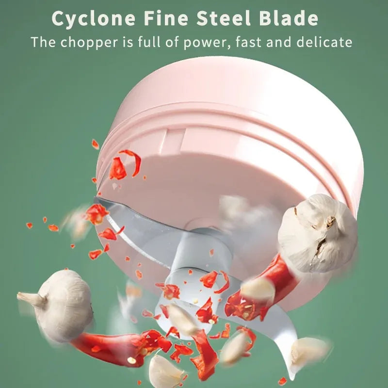 Electric garlic chopper by WinniHouse, USB-powered, 250ml capacity, compact design, ideal for quick garlic mincing.