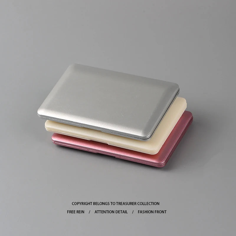 Portable creative mini makeup mirror with laptop shape, foldable and high-quality, ideal for beauty touch-ups on the go.