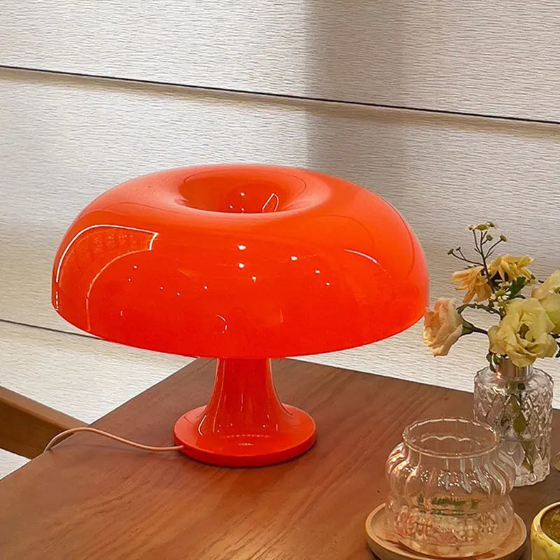 LED mushroom-shaped desk lamp by WinniHouse with a modern, sleek design and warm light for reading or decorative use.