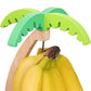 Wooden hanging kitchen shelf shaped like a banana by WinniHouse, featuring a natural finish and compact design.