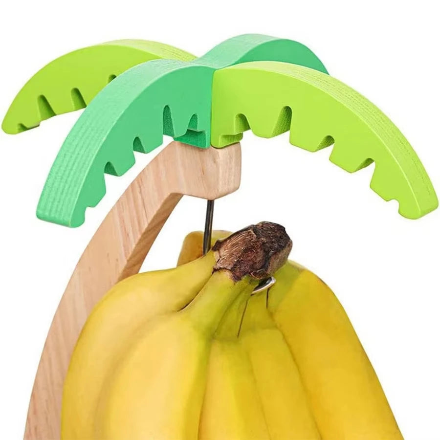 Wooden hanging kitchen shelf shaped like a banana by WinniHouse, featuring a natural finish and compact design.