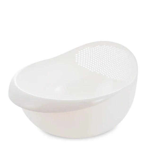 Plastic rice strainer and kitchen colander by WinniHouse for washing rice, fruits, and vegetables in the sink.