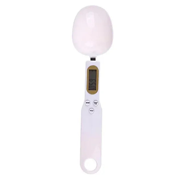 Digital 500g WinniHouse precision kitchen scale with LCD display and measuring spoon, showing measurement in grams.