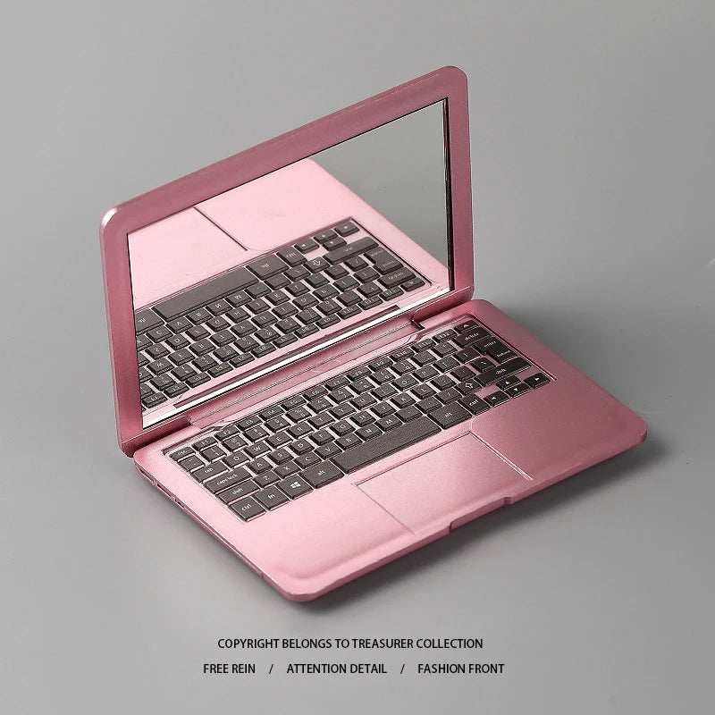 Portable creative mini mirror for laptops by WinniShop, foldable makeup mirror with laptop shape, pocket-sized beauty accessory.