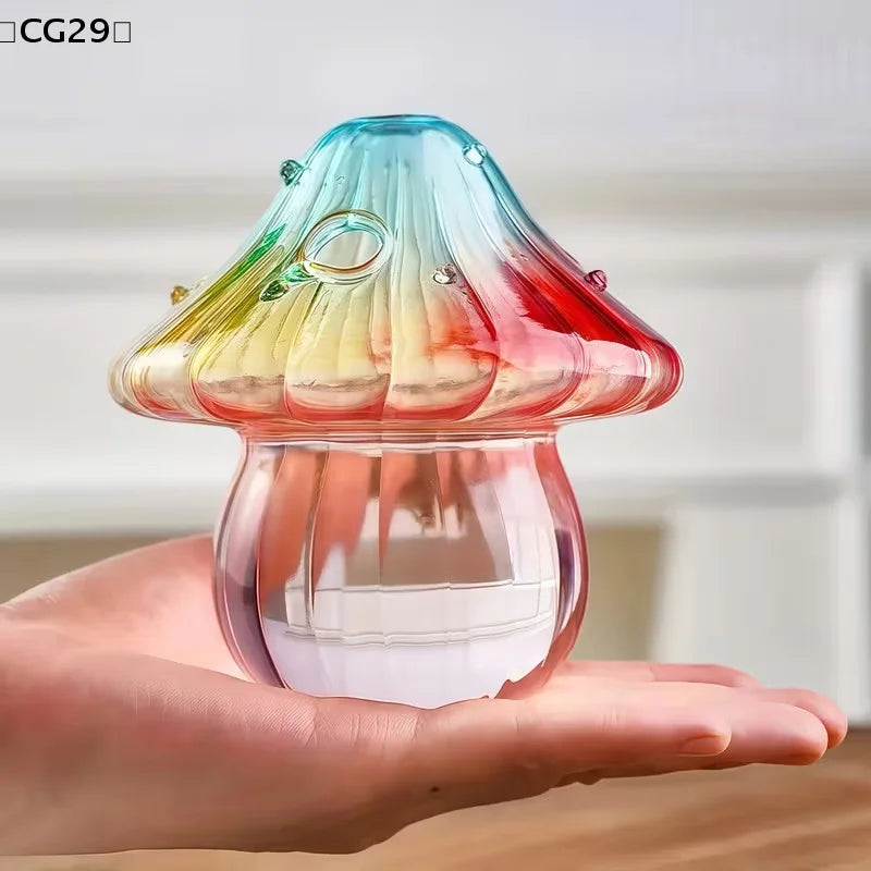 Colorful glass mushroom-shaped vase by WinniHouse, vibrant and decorative for floral arrangements or home decor.