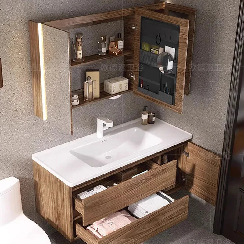 Modern minimalist bathroom cabinet by WinniShop with walnut finish, integrated ceramic sink, and sleek storage for home.