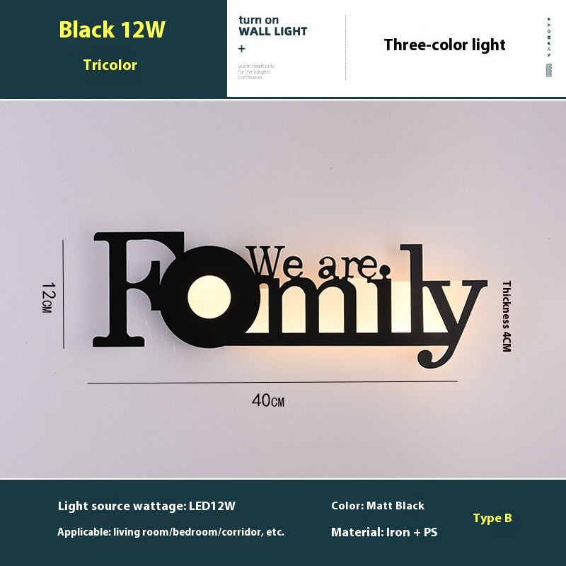 WinniHouse LED English letter wall lamp mounted on a background wall, creating a modern and creative lighting decor feature.