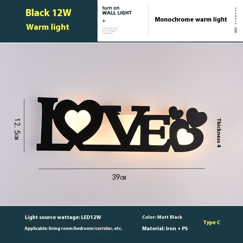 WinniHouse LED English letter wall lamp mounted on a background wall, showcasing creative lighting design and modern decor style.