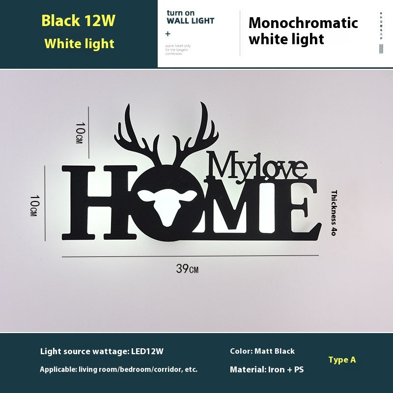 WinniHouse LED English letter wall lamp illuminated on a background wall, showcasing creative lighting design.