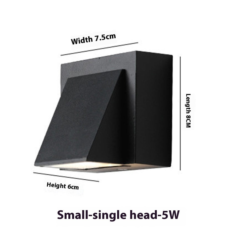 Waterproof wall lamp by WinniHouse mounted on a courtyard background wall, providing outdoor illumination and modern aesthetic.