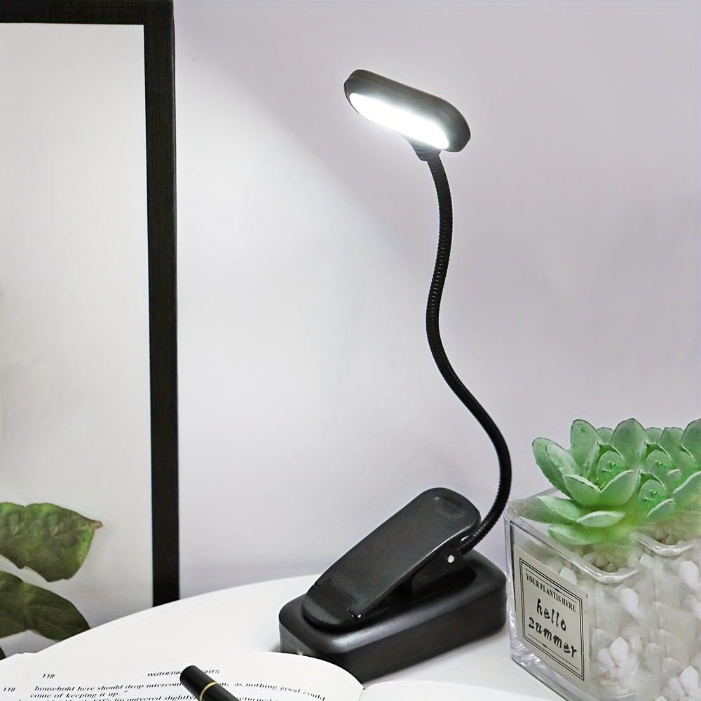 WinniHouse LED desk lamp with adjustable arm and clip, battery-powered, modern minimalist design for reading and work at home or office.