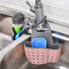 WinniHouse multifunctional sink sponge rack with adjustable strap, hanging bag for kitchen and bathroom organization and drainage.