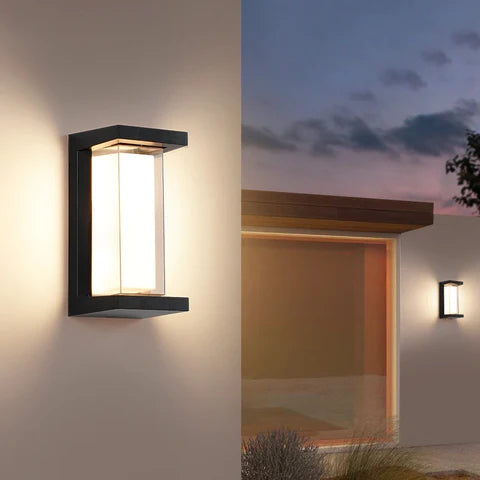 WinniHouse waterproof outdoor wall lamp installed on garden wall, providing stylish illumination for outdoor spaces.